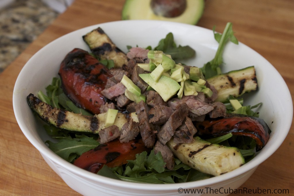 Grilled flank steak, peppers, and zucchini over a bed of arugula, topped with chunks of avocado.