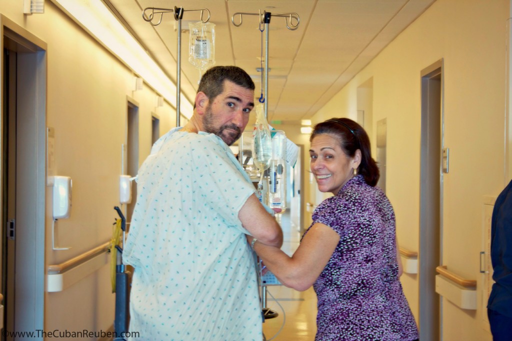 Mom and dad, reaching a recovery milestone by walking around the hospital floor.